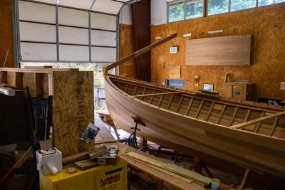 Students work with instructors at the Northwest School of Wooden Boatbuilding, in Port Townsend, Washington on July 25, 2023. The NSWB has been in operation of over 40 years, teaching students wooden boatbuilding skills and helping launch careers in that industry.